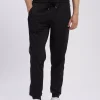 Spodnie dresowe męskie czarne 49044-020<Cross Jeans Fashion